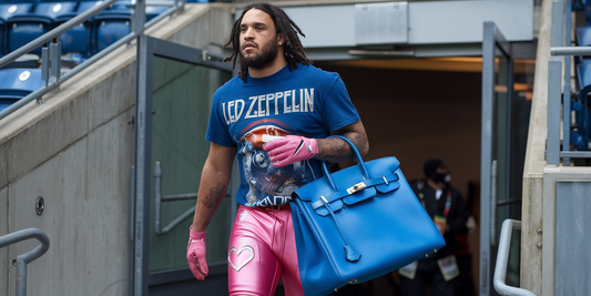 Saquon Barkley's Fashion Fumble: Hot Pink Jeans & a Birkin Bag Before the Game!