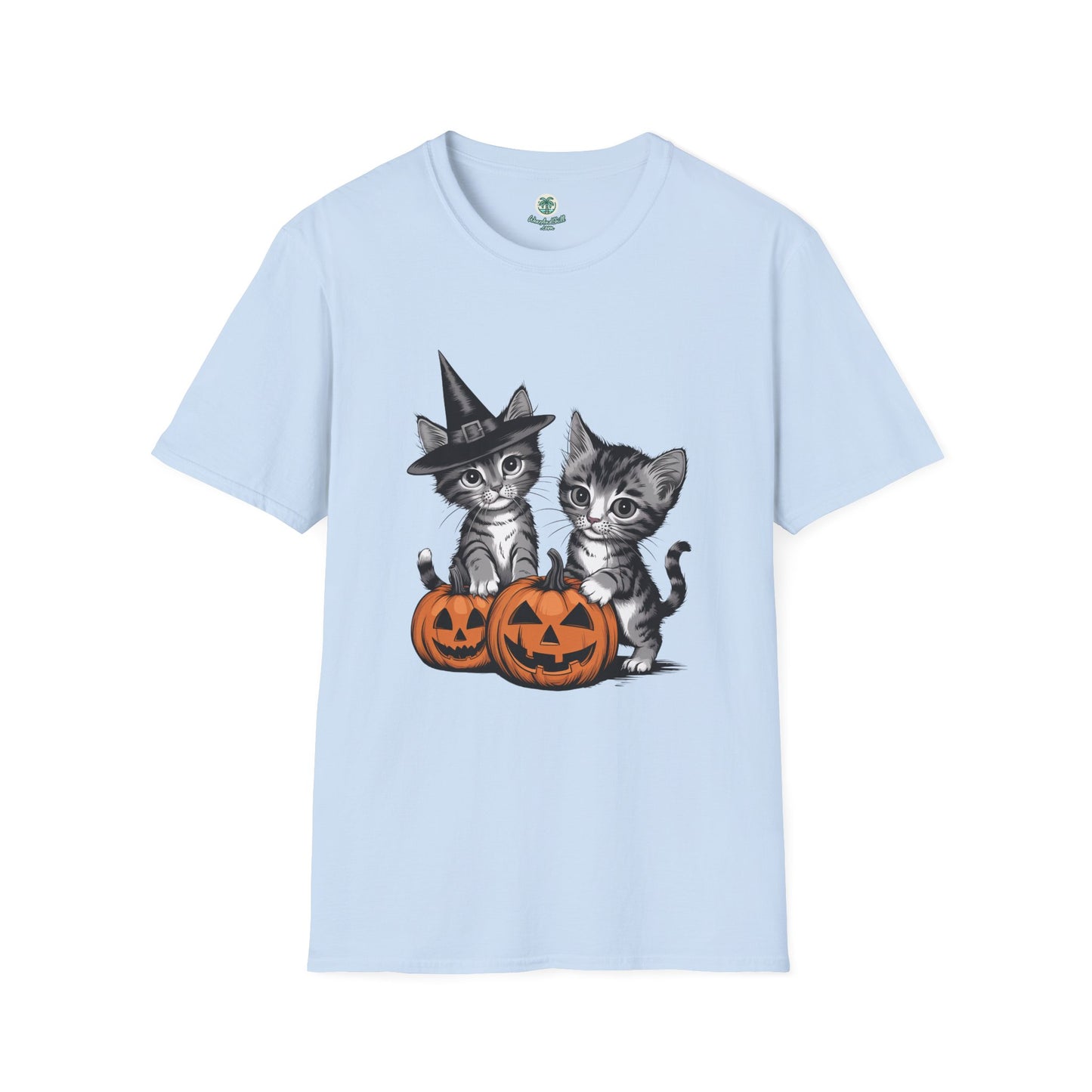 Gothic kittens playing with pumpkins